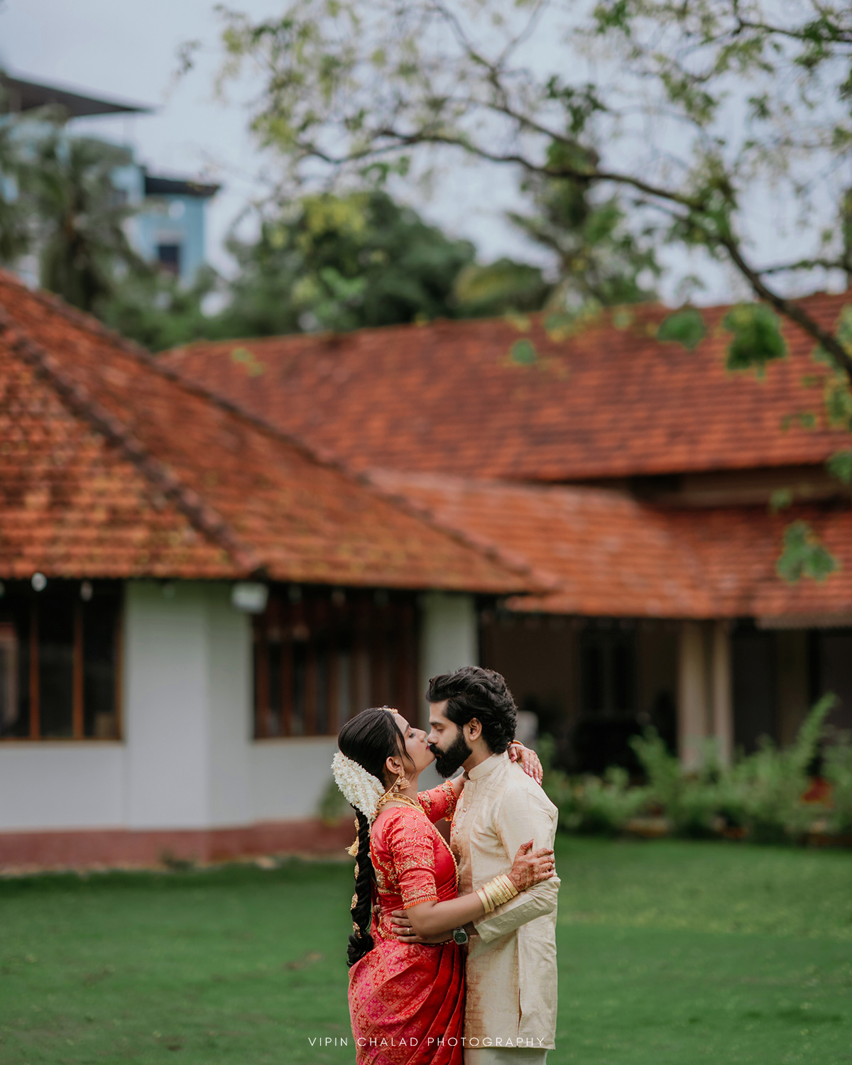 Couple walking through a garden